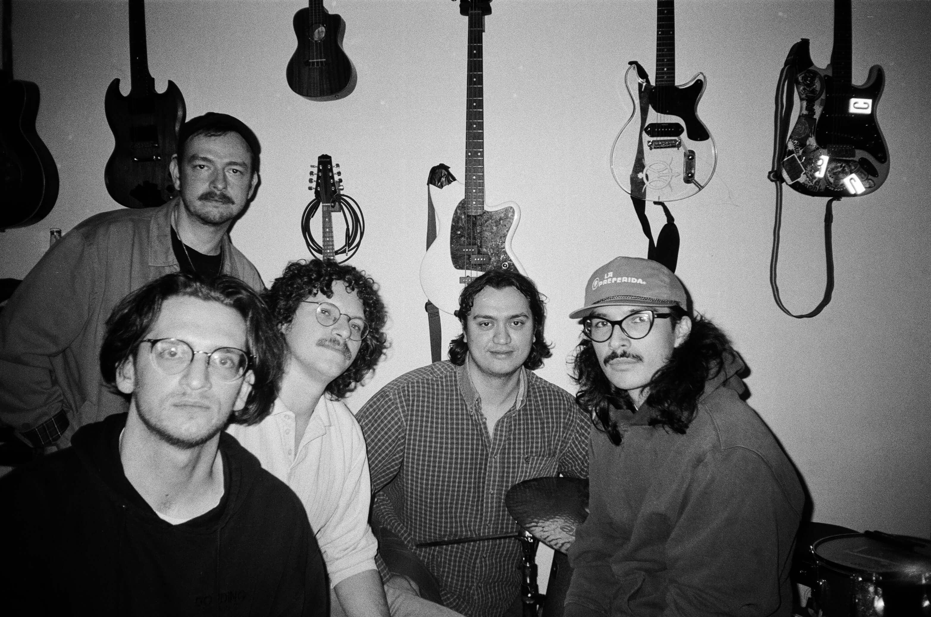 Black and white photo of Dog Ear band members.